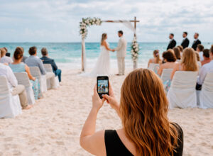 wedding-content-creator-filming-natural-love-story-moments-during-ceremony - WEGROUP